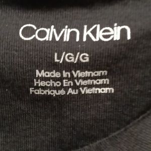 NWOT Calvin Klein black short sleeve blouse w silver buttons & emblem Sz L/G/ G